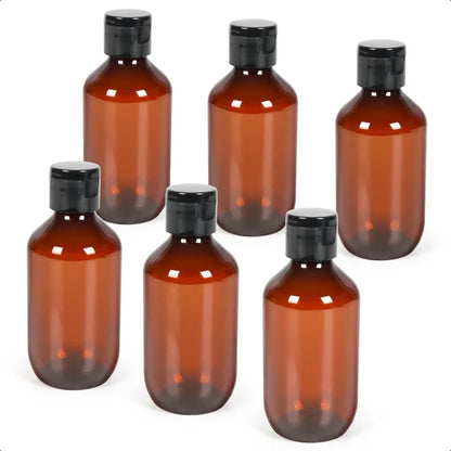 Travel Size Amber Bottles with Flip Cap 6 Pack 3.4oz Leak Proof Dispenser Containers for Toiletries Essential Oils and Shampoo
